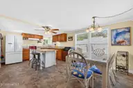 2495 Barracuda Street SW, Supply, NC 28462 — 2-bedroom manufactured home in Sandy Shoals, Supply, NC, photo 17 of 54: Kitchen & Dining Area