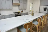 166 Champions Ridge Drive, Southern Pines, NC 28387 — 3-bedroom home in Mid South Club, Southern Pines, NC, photo 12 of 45: 15KitchenIsland