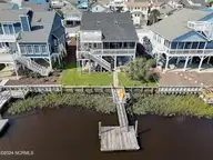 415 Sailfish Street, Sunset Beach, NC 28468 — 4-bedroom waterfront home in Sunset Beach, Sunset Beach, NC, photo 4 of 63: Canal Front