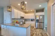 5103 W Beach Drive, Oak Island, NC 28465 — 4-bedroom waterfront home in W. Long Beach, Oak Island, NC, photo 3 of 65: 5103 W Beach Drive 2