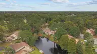 84 Quarterdeck Townes, New Bern, NC 28562 — 3-bedroom waterfront townhome in River Bend, New Bern, NC, photo 14 of 46: 10-web-or-mls-DJI_20251014111139_0532_D