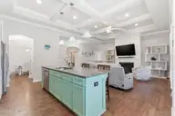 4054 Druids Glen Drive, Leland, NC 28451 — 3-bedroom home in Brunswick Forest, Leland, NC, photo 12 of 76: Island Bar