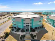 301 Commerce Way E 205, Atlantic Beach, NC 28512 — 2-bedroom condo in Sea Spray, Atlantic Beach, NC, photo 3 of 42: 2-web-or-mls-DJI_20260224120755_0181_D