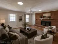 2903 Dare Court, New Bern, NC 28562 — 3-bedroom home in Colony Estates, New Bern, NC, photo 4 of 33: Virtually Staged Family Room