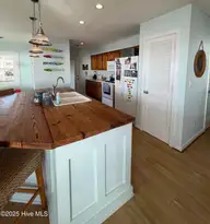 801 Ocean Drive, Emerald Isle, NC 28594 — 4-bedroom waterfront home, Emerald Isle, NC, photo 11 of 32: 11 Kitchen with pantry