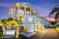 309 Red Lewis Drive 12, Kure Beach, NC 28449 — 4-bedroom townhome in The Cove at Kure Beach, Kure Beach, NC, photo 6 of 44: cove-entrance-twilight