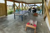 124 Salt Marsh Way, Atlantic Beach, NC 28512 — 4-bedroom waterfront home in Salt Marsh Villas, Atlantic Beach, NC, photo 23 of 32: Pink24