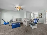8713 Plantation Drive 402, Emerald Isle, NC 28594 — 3-bedroom waterfront townhome in Emerald Plantation, Emerald Isle, NC, photo 5 of 68: Living Room