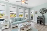 6415 Bryson Drive SW, Ocean Isle Beach, NC 28469 — 3-bedroom home in Retreat At OIB, Ocean Isle Beach, NC, photo 24 of 64: Sunroom
