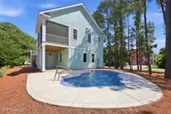 309 Shipwreck Lane, Emerald Isle, NC 28594 — 4-bedroom home in Spinnakers Reach, Emerald Isle, NC, photo 4 of 45: Exterior