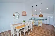 101 Shipwreck Lane E, Emerald Isle, NC 28594 — 3-bedroom waterfront townhome in Spinnakers Reach, Emerald Isle, NC, photo 8 of 38: Dining Room