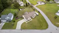 114 Trailwood Drive, Hubert, NC 28539 — 4-bedroom home in Trailwood, Hubert, NC, photo 1 of 25: Aerial View