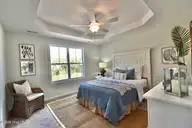 109 Bristol Bay Drive, Lake Waccamaw, NC 28450 — 3-bedroom home in Bristol Bay, Lake Waccamaw, NC, photo 9 of 22: PRIMARY SUITE