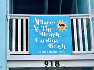 918 Carolina Beach Avenue N 2b, Carolina Beach, NC 28428 — 2-bedroom waterfront condo in A Place At The Beach, Carolina Beach, NC, photo 23 of 28: 918 CB Ave N 2B sign