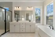 115 S Middleton Drive NW, Calabash, NC 28467 — 4-bedroom waterfront home in Brunswick Plantation, Calabash, NC, photo 19 of 38: Primary Bathroom