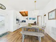 117 Salisbury Street, Holden Beach, NC 28462 — 3-bedroom waterfront home, Holden Beach, NC, photo 8 of 40: Dining/Kitchen