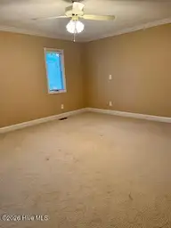 103 Pinnacle Court, West End, NC 27376 — 3-bedroom waterfront townhome in Seven Lakes West, West End, NC, photo 13 of 34: Primary Bedroom 1