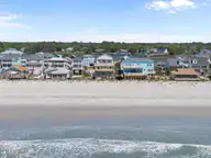 1717 W Beach Drive, Oak Island, NC 28465 — 4-bedroom waterfront home, Oak Island, NC, photo 10 of 60: 12-web-or-mls-DJI_20260416120101_0902_D