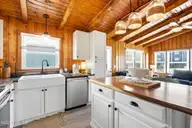 1914 E Beach Drive, Oak Island, NC 28465 — 3-bedroom waterfront home, Oak Island, NC, photo 11 of 69: shniderproductions.com-37