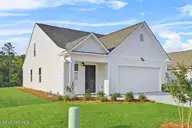 517 Belfort Lane SW 77, Ocean Isle Beach, NC 28469 — 4-bedroom home in Glendale Arbor, Ocean Isle Beach, NC, photo 2 of 34: 77 front angle 2
