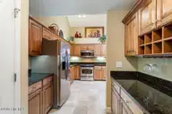103 E Chelsea Court, Southern Pines, NC 28387 — 2-bedroom condo in Mid South Club, Southern Pines, NC, photo 18 of 54: Kitchen