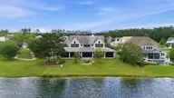 4030 Reunion Pointe Lane, New Bern, NC 28562 — 4-bedroom waterfront home in Carolina Colours, New Bern, NC, photo 11 of 73: 5-web-or-mls-DJI_20260617115826_0710_D