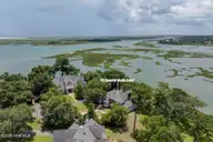 112 Coastal Bluffs Court, Hampstead, NC 28443 — 4-bedroom waterfront home in Olde Point, Hampstead, NC, photo 1 of 37: Expansive Water View