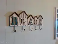 918 Carolina Beach Avenue N 2b, Carolina Beach, NC 28428 — 2-bedroom waterfront condo in A Place At The Beach, Carolina Beach, NC, photo 5 of 28: 918 CB Ave N 2B bsign