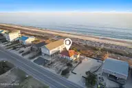 4025 E Beach Drive, Oak Island, NC 28465 — 3-bedroom waterfront home in Long Beach, Oak Island, NC, photo 6 of 40: 7-web-or-mls-CAMMediaLLC.com (7 of 47)