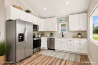 161 Long Pond Loop, Swansboro, NC 28584 — 2-bedroom waterfront condo in Cabins at Old Horse, Swansboro, NC, photo 5 of 23: Kitchen Virtually Staged