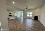 106 Manchester Court, La Grange, NC 28551 — 4-bedroom home in Hadley Acres, La Grange, NC, photo 7 of 29: living room and Kitchen