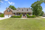 1232 Wood Lily Circle, Leland, NC 28451 — 4-bedroom waterfront home in Waterford of the Carolinas, Leland, NC, photo 1 of 56