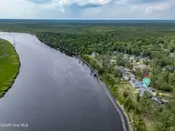 3623 White Cliffs Drive, Castle Hayne, NC 28429 — 3-bedroom waterfront home in River Bluffs, Castle Hayne, NC, photo 2 of 70: 079_dji_20250612163954_0166_d_copy_489