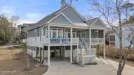 1607 E Yacht Drive, Oak Island, NC 28465 — 3-bedroom home, Oak Island, NC, photo 2 of 62: 51-web-or-mls-DJI_20260224150314_0010_D
