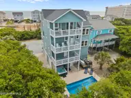 6 Bottlenose Boulevard, North Topsail Beach, NC 28460 — 4-bedroom waterfront home in Dolphin Shores, North Topsail Beach, NC, photo 3 of 48: 9-web-or-mls-DJI_20250506132029_0220_D