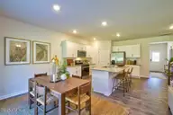10507 Beard Way, Bailey, NC 27807 — 4-bedroom home in Beaver Dam Crossing, Bailey, NC, photo 17 of 51: 21-Dining Room to Kitchen