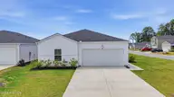 1083 Tripletail Drive NW Lot 123, Sunset Beach, NC 28468 — 4-bedroom home in Sunfish Cove, Sunset Beach, NC, photo 1 of 42: Front
