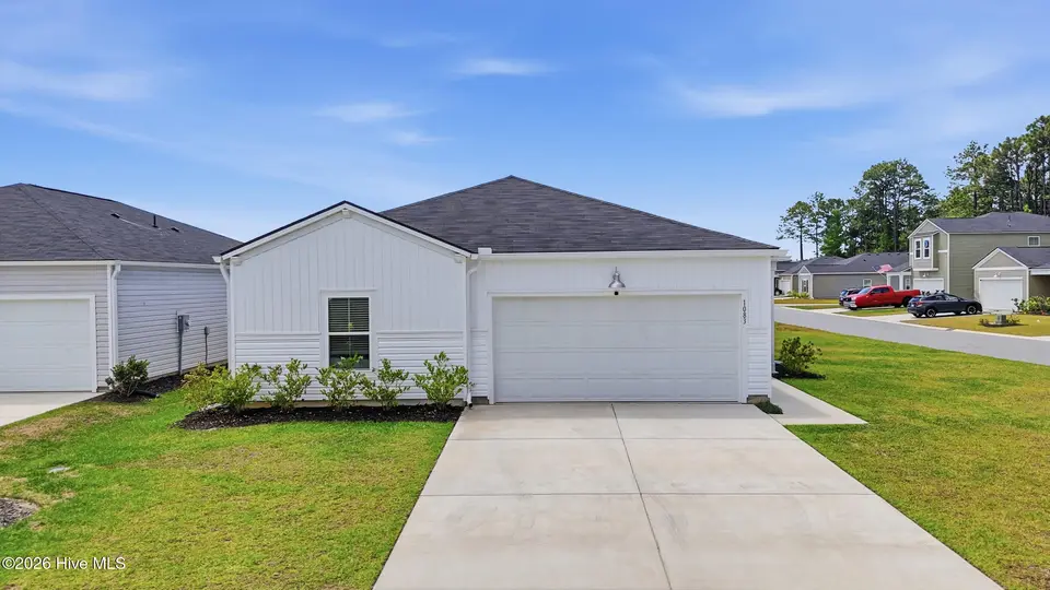 1083 Tripletail Drive NW Lot 123, Sunset Beach, NC 28468 — 4-bedroom home in Sunfish Cove, Sunset Beach, NC, photo 1 of 42: Front