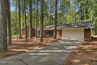 228 Heather Lane, Southern Pines, NC 28387 — 3-bedroom home in Highland Trails, Southern Pines, NC, photo 3 of 43: Front
