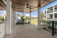 805 Mulberry Street Unit 113, Beaufort, NC 28516 — 1-bedroom condo in 805 Mulberry, Beaufort, NC, photo 22 of 30: Porch overlooking Courtyard