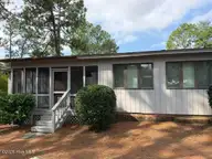 120 Sandham Court, Seven Lakes, NC 27376 — 2-bedroom townhome in Seven Lakes South, Seven Lakes, NC, photo 6 of 33: Carolina room
