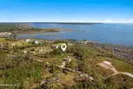 166 Fulcher Landing Drive, Stacy, NC 28581 — waterfront lot, Stacy, NC, photo 12 of 22: Waterfront vacant lot in Stacy