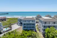 876-878 Villas Drive, North Topsail Beach, NC 28460 — 12-bedroom waterfront home, North Topsail Beach, NC, photo 2 of 71: 876_878 Villas Drive - Aerial - Edited_2