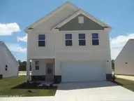 1243 Evening Walk Drive NE, Winnabow, NC 28479 — 3-bedroom home in Bell Meadows, Winnabow, NC, photo 1 of 27