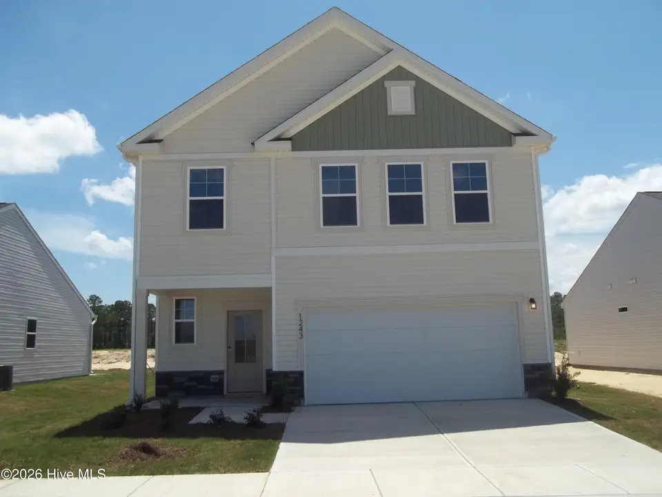 1243 Evening Walk Drive NE, Winnabow, NC 28479 — 3-bedroom home in Bell Meadows, Winnabow, NC, photo 1 of 27