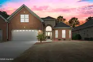 4021 Alastaire Cove, Leland, NC 28451 — 4-bedroom townhome in Brunswick Forest, Leland, NC, photo 1 of 43: Front