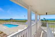 2401 W Ft Macon Road 220 Ocean Sands, Atlantic Beach, NC 28512 — waterfront condo in Ocean Sands, Atlantic Beach, NC, photo 4 of 35: View of Pool & Ocean Outside Unit 220