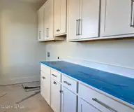 105 Marshland Circle, Newport, NC 28570 — 4-bedroom home in Cannonsgate, Newport, NC, photo 10 of 16: Second Floor Laundry Under Construction