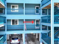 1404 Canal Drive 15, Carolina Beach, NC 28428 — 2-bedroom condo in Ocean Harbor, Carolina Beach, NC, photo 4 of 32: 31-Final 1404 Canal Dr Unit 15-RJREM p2