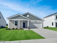 563 Coronado Avenue SE, Leland, NC 28451 — 3-bedroom home in Herring Shores, Leland, NC, photo 1 of 17: Dunlin Lot 57